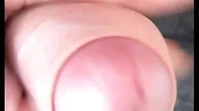 Sitting on a bench in public slapping my balls until i couldn't take it non-U more then i jerked off added to shot cum on my dick