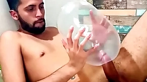 Fucking an inflated condom until i cum median of it. i fuck it so gaping void it explodes. wonder how would it feel median your ass