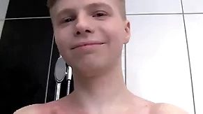 Cute soapy boy alone in a shower