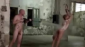 Young guy is bound and tormented in b. gay threesome