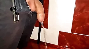 Small uncut cock pissing
