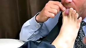 Businessman has his feet and toes sucked one unconnected with one unconnected with gay