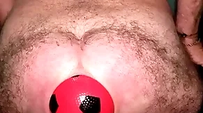 World record 13 cm wide anal stretching with inflatable ball.