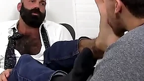 Bald bearded clog grovelling worshipped and licked by young pal