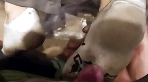 Two young guys dirty socks footjob