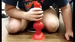 I play with my huge dilto with an increment of i cum in my chastity cage