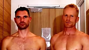 Handsome blonde fitness trainer serviced by a huge dick guy.