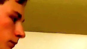 Good looking twink plays with his dick in the shower solo