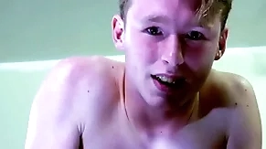 A straight blond boy is near tears while being spanked