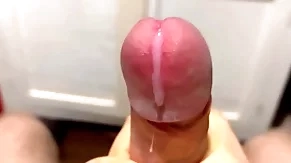 Cumming in close-up with a Herculean portion of cum in slow motion / big uncut veiny cock / pissing